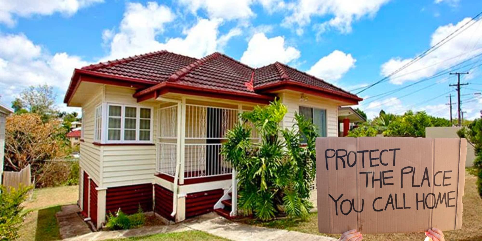 A house and a placard that says 'Protect the place you call home'